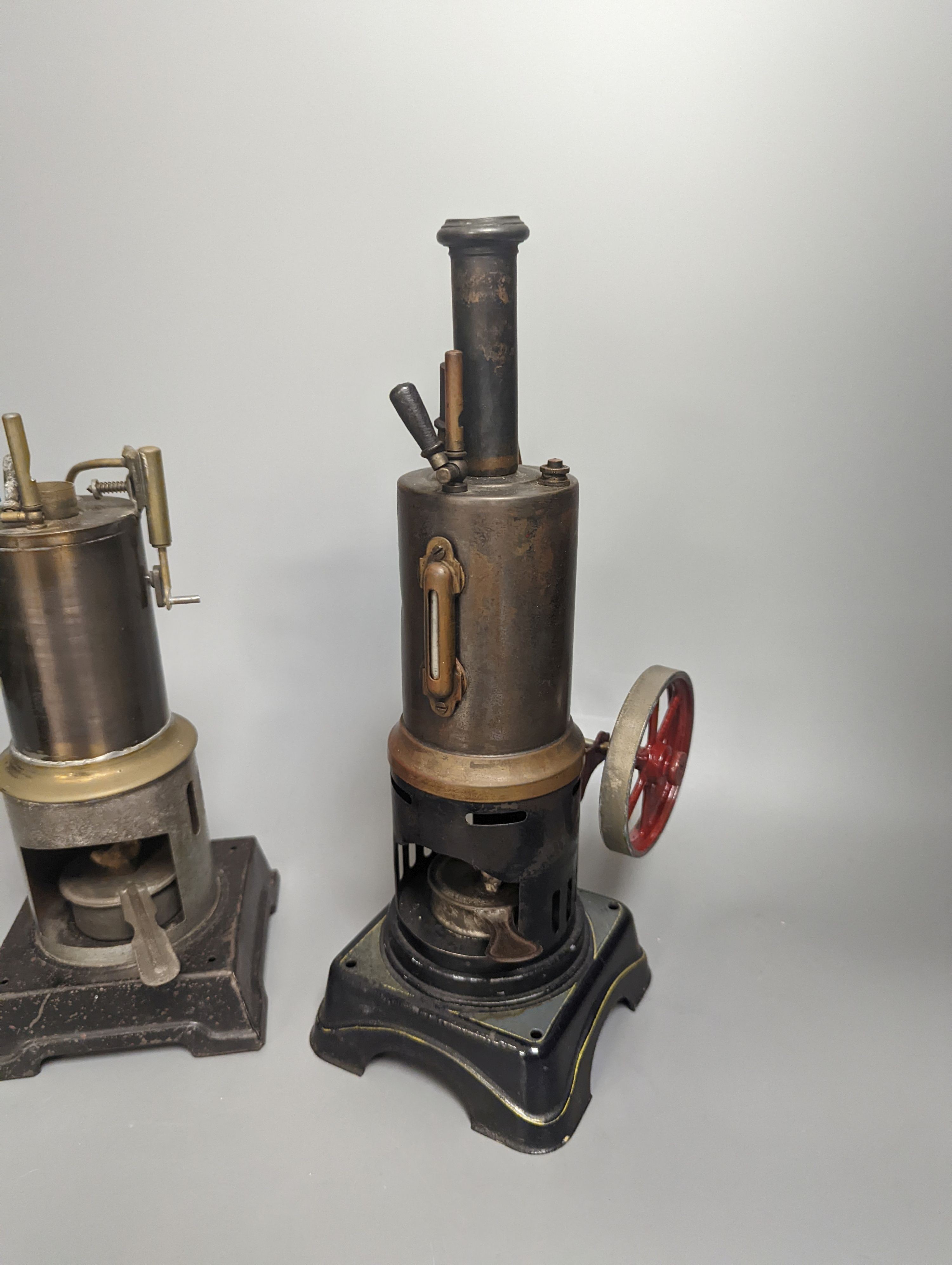 A Bing tinplate model boiler, 28.5 cm high and two other tinplate model boilers